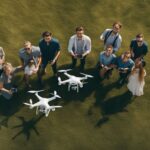 A group of people learning to use drones