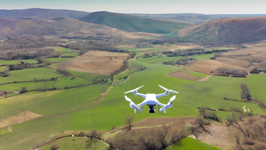 image showcasing a mid-range drone hovering above a picturesque landscape, capturing the vastness of its coverage and distance